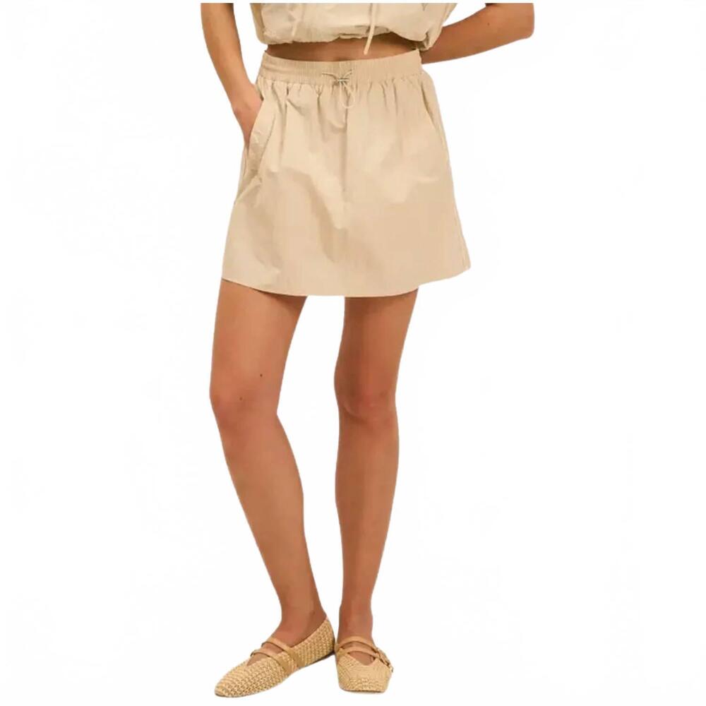 NEW THE GREII women's sporty chic piping detail skirt in beige